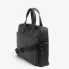 Black faux-leather overnight bag