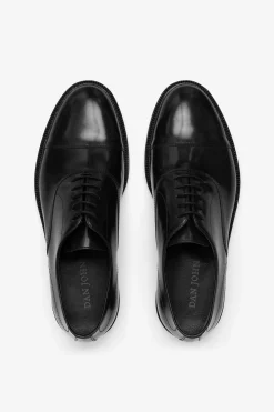 Black lace-up shoes