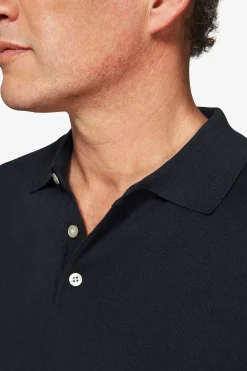Blue knit polo shirt