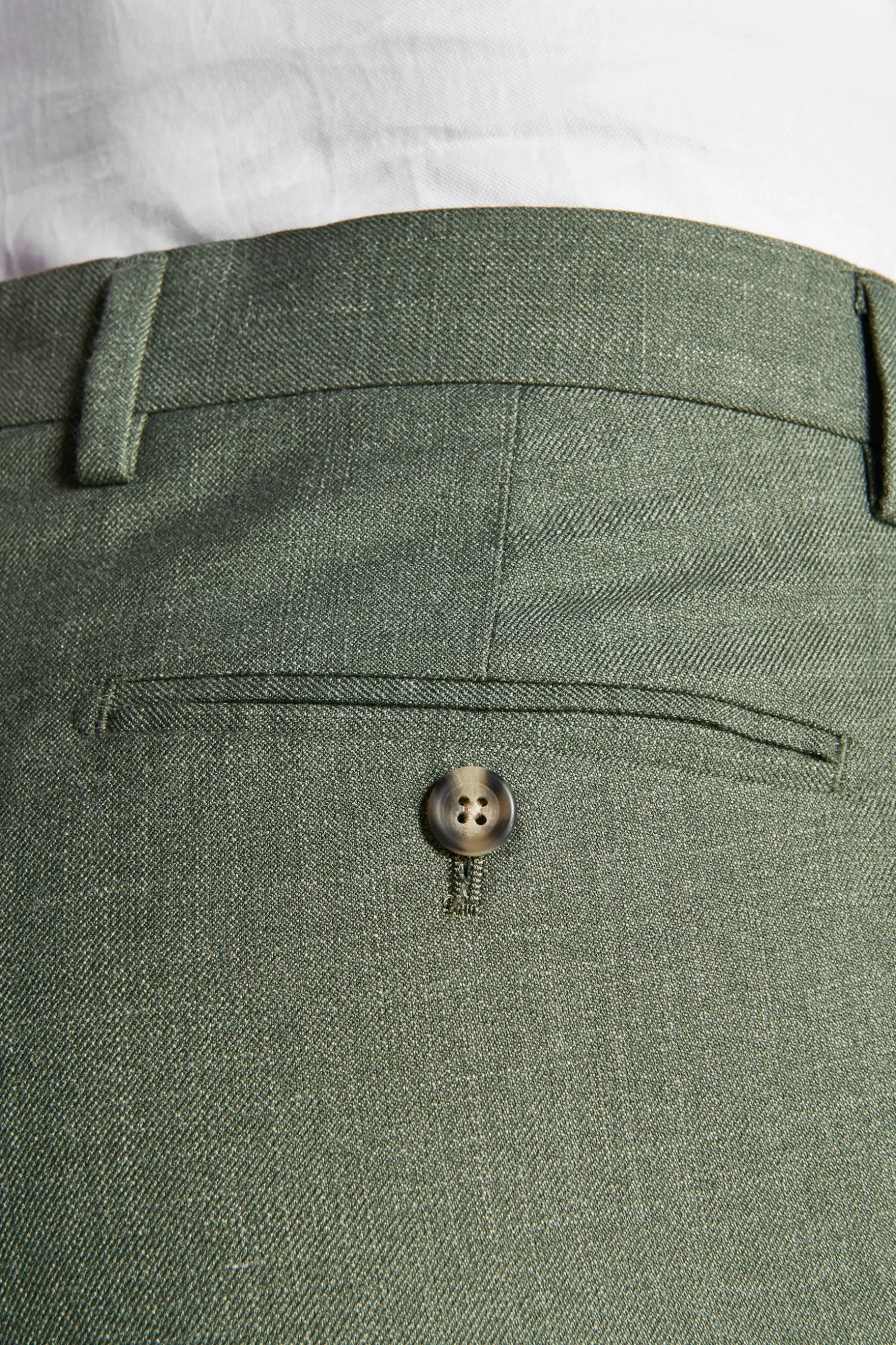 Green slub fabric trousers