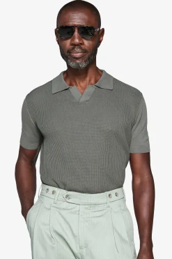 Green textured knit polo shirt