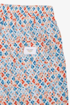Orange lily print swim trunks