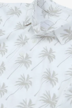 Polo piquet stampa palme panna