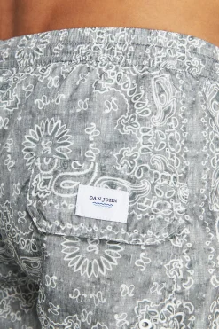 Sage floral print swim trunks