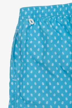 Turquoise penguin print swim trunks